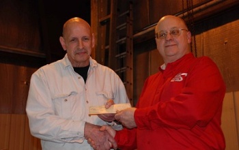 Louie Fura receives YAA check from Gene Sprang