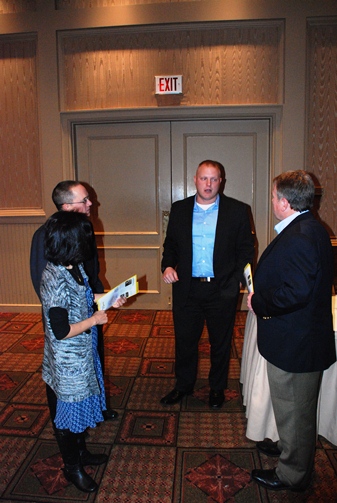 Mike Stehle talks to guests after dinner.
