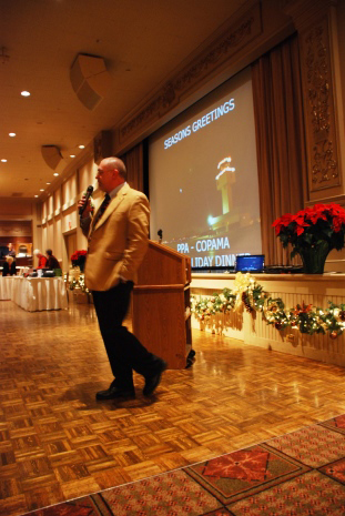 Geff Gruber MC's the 2013 Holdiay Dinner